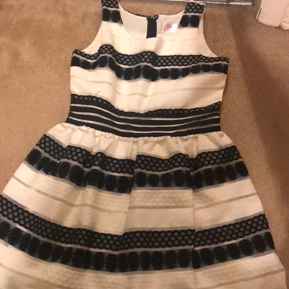 A patterned black and white dress.